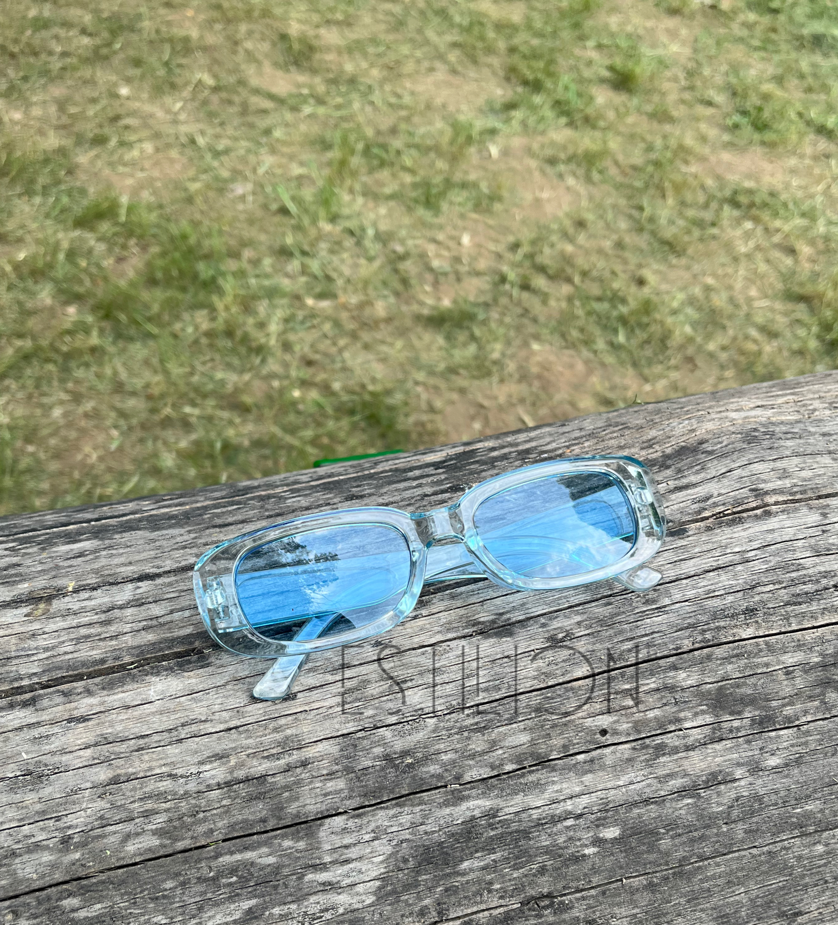 “Estilion blue sunglasses”